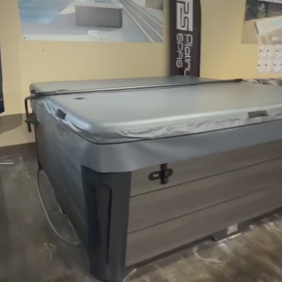 AIRCAP 1 cover folding back onto a cover lifter and closing again at Southern Leisure Spas & Wellness
